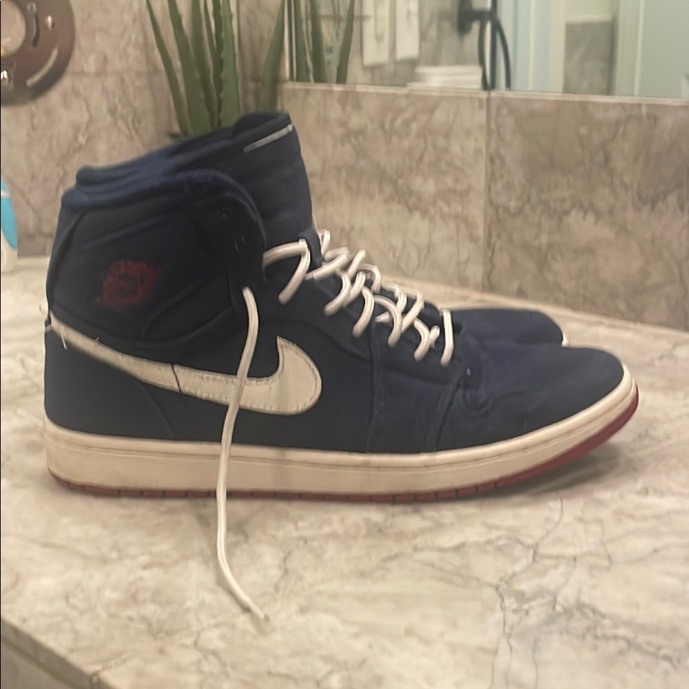 Jordan Blue and White Jordan 1 Sneakers